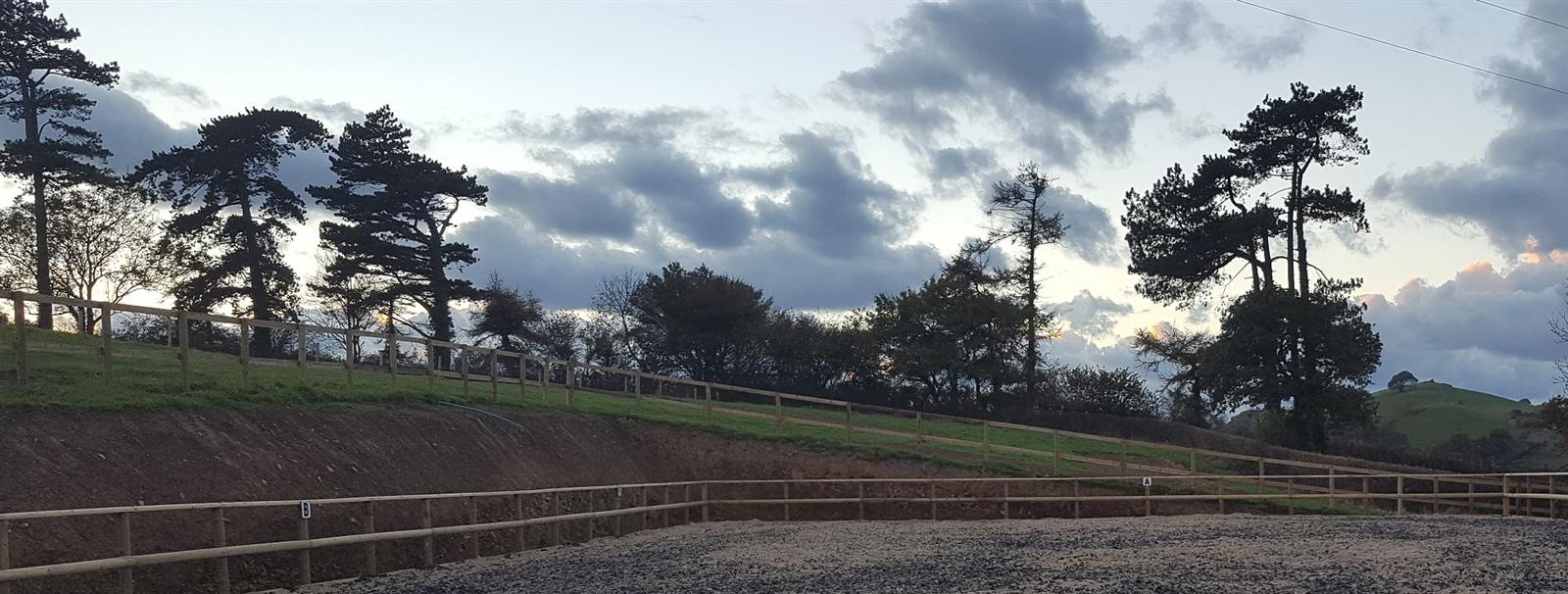 The all-weather arena at dusk